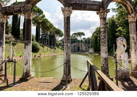 Ancient ruins of Villa Adriana(Canopus canal pool surrounded by columns and statues) Tivoli Italy
