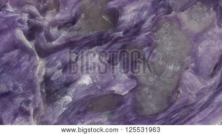 Polished charoite stone smooth texture detailed macro