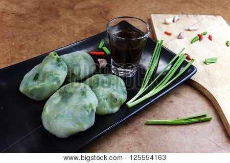 Allium tuberosum. Garlic chives with soy source. Dim sum is chinese cuisine.