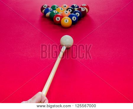 Game of american billiards played on a billiard table for two persons