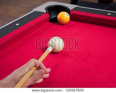 Game of american billiards played on a billiard table for two persons