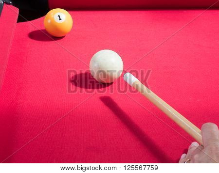 Game of american billiards played on a billiard table for two persons
