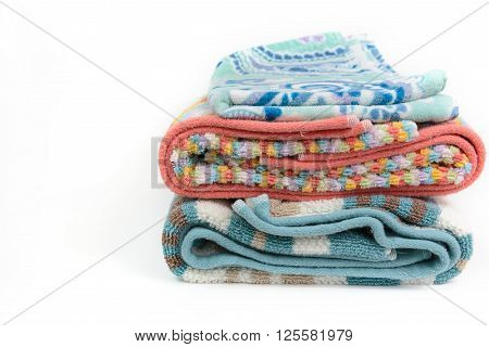 Clean colorful towel folding and stack on isolated background