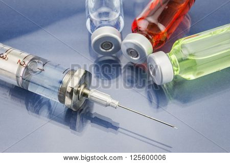 Diagnosis - Treatment and prevention. Medical Report with Composition of Medicaments - Vials Injections and Syringe. Selective Focus
