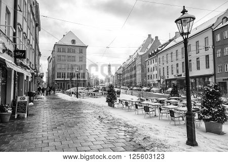 Augsburg Germany - January 17 2016: Old town street in city of Augsburg during winter time. Augsburg is Germany's third oldest city.