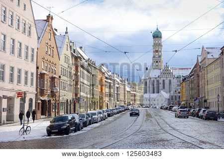 Augsburg Germany - January 17 2016: Old town street in city of Augsburg during winter time. Augsburg is Germany's third oldest city.