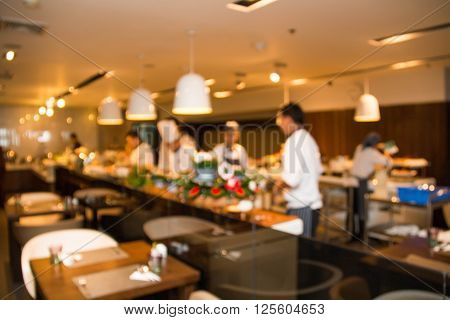 Abstrast Blurred background : restaurant cafe blur with chef