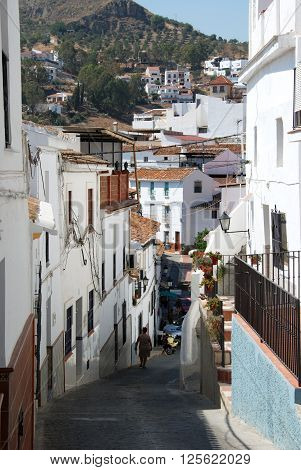 ALORA, SPAIN - JUNE 27, 2008 - Townhouses along a steep old town street Alora Malaga Province Andalusia Spain Western Europe, June 27, 2008.