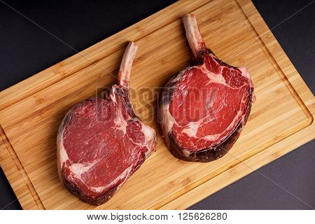 Raw Dry aged tender delicious Tomahawk Steak