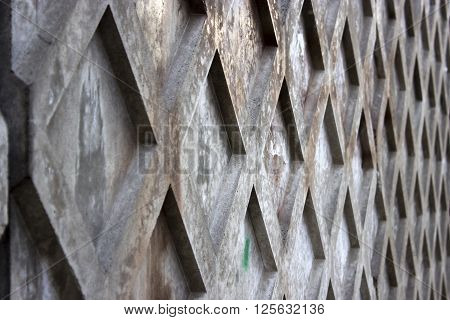 rock wall on which many rhombuses wallpeper