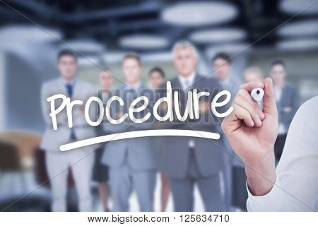 Mid section of businessman writing with marker against word procedure underlined