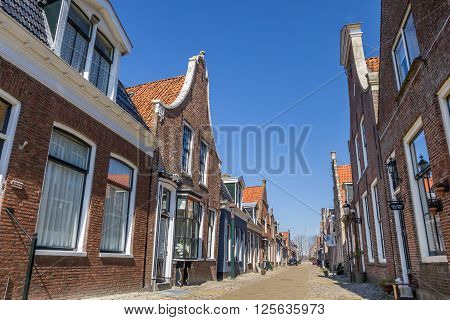 HINDELOOPEN, NETHERLANDS - APRIL 11, 2016: Old street in the historical city Hindeloopen, Netherlands