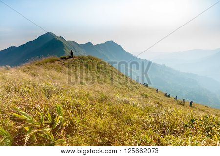 Tourists hiking on (Khao Chang Puak) of mountains at Kanchanaburi Thailand.
