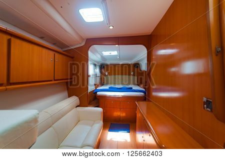 Bed and funiture in a luxury yacht boat decoration