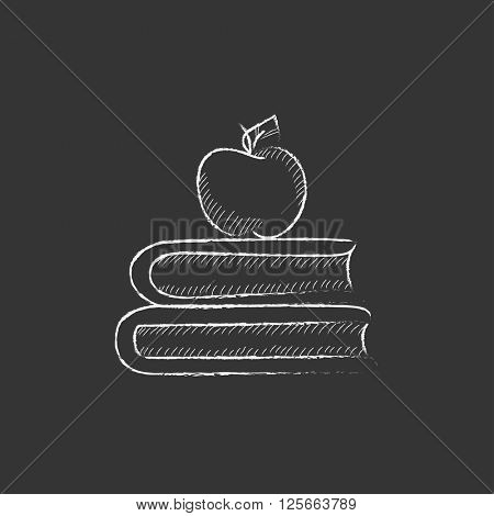 Books and apple on top. Drawn in chalk icon.