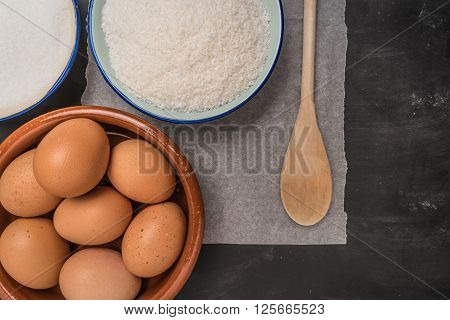 Ingredients for baking a cookies. Recipe for coconut macaroons. Top view with copy space.