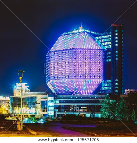 MINSK, BELARUS - SEPTEMBER 28, 2014: Unique Building Of National Library Of Belarus In Minsk At Night Scene. Building Has 23 Floors And Is 72-metre High. Library can seat about 2, 000 readers and features a 500-seat conference hall.