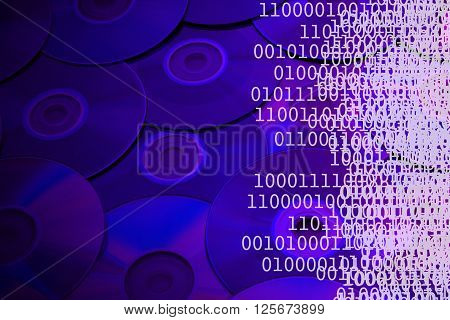 CDs and white binary code blue background.