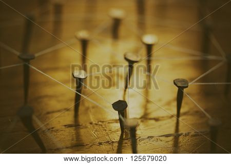 Rustic Nails In Wood Linked By Cotton
