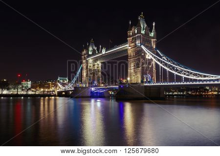 London, UK - March 31, 2016 - Night view of Tower Bridge from the south bank of the Thames