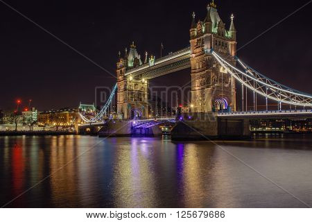 London, UK - March 31, 2016 - Night view of Tower Bridge from the south bank of the Thames