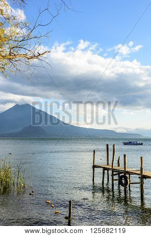 Evening light on Lake Atitlan & Toliman volcano Guatemala.