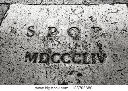 Rome, Italy, april 2016: the most famous acronym of history: Senatus Populusque Romanus with 1854 written in roman numbers