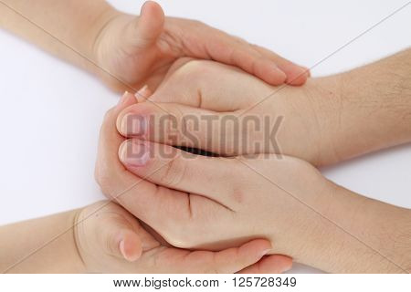 children hands touch the child to her mother's hands