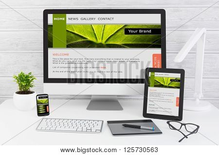 Designer's desk with responsive web design concept.