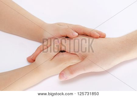Child hands in tenderness took hold of her mother's hand