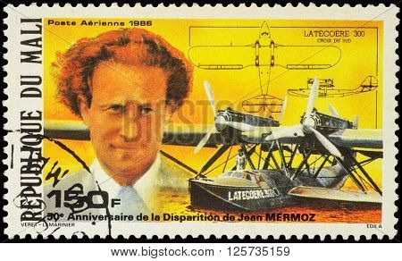 MOSCOW RUSSIA - APRIL 12 2016: A stamp printed in Mali shows French aviator Jean Mermoz and seaplane 