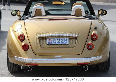 Monte-Carlo Monaco - April 6 2016: Golden Mitsuoka Roadster Parked in Front of the Monte-Carlo Casino in Monaco
