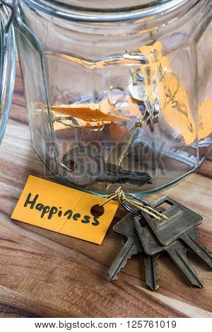 concept image using hand written tags and and old jar with the keys to life in it