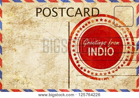 greetings from indio, stamped on a postcard