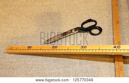 Scissors And The Wooden Meter In Italian Artisan Tailoring