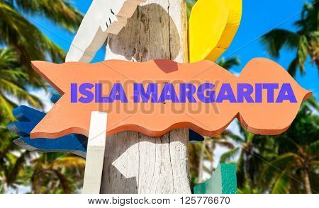 Isla Margarita signpost with palm trees