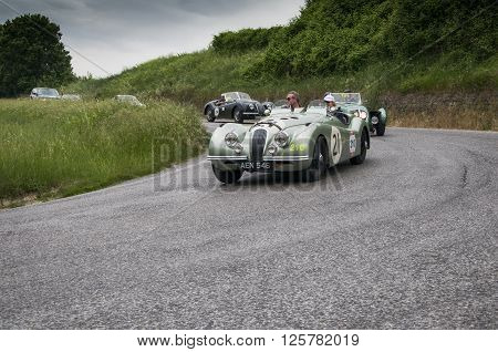 PESARO, ITALY - MAY 15: JAGUAR XK 120 OTS Sports 1950 on an old racing car in rally Mille Miglia 2015 the famous italian historical race (1927-1957) on May 2015