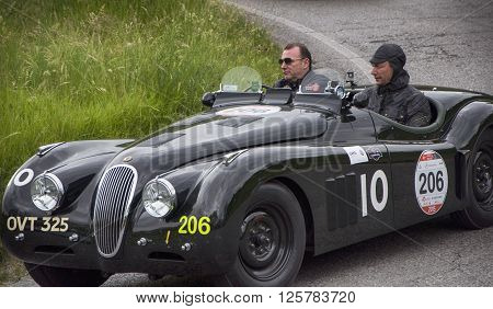 PESARO, ITALY - MAY 15: JAGUAR XK 120 OTS Sports 1950 on an old racing car in rally Mille Miglia 2015 the famous italian historical race (1927-1957) on May 15 2015
