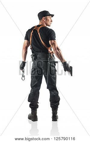Police Officer With Handcuffs And Gun. Isolated On White.