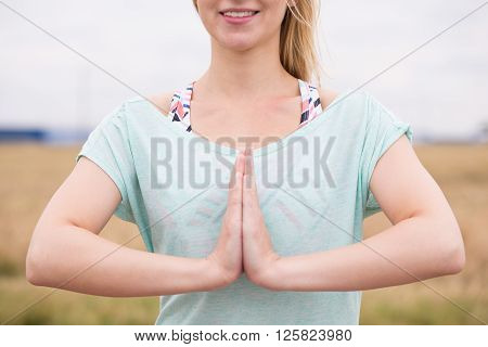 Woman In Prayer Pose