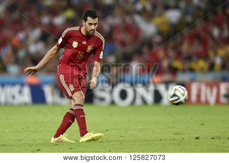 RIO DE JANEIRO BRAZIL - June 18 2014: Sergio BUSQUETS of Spain during the 2014 World Cup. Spain is facing Chile in the Group B at Maracana Stadium