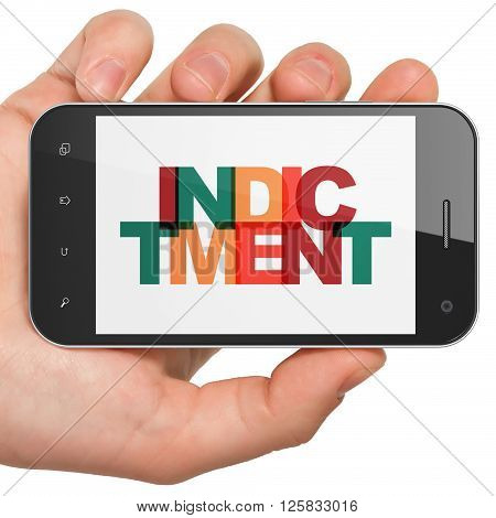 Law concept: Hand Holding Smartphone with Indictment on  display
