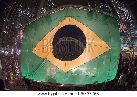Rio de Janeiro Brasil - March 31 2016: Party workers and social movements are protests in defense of democracy and against the impeachment of President Dilma in the city center in Largo da Carioca