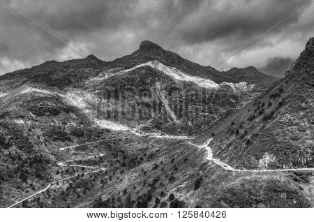 Beautiful famous curvy roads on Old Silk Route Silk trading route between China and India Sikkim - black and white image