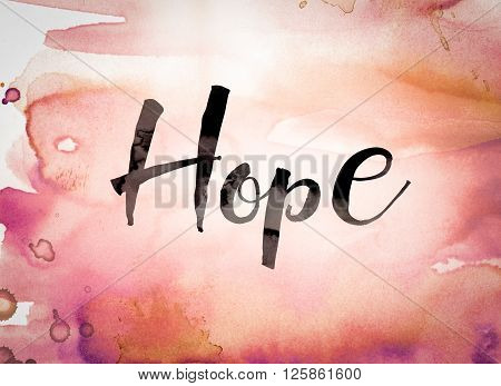 The word "Hope" written in black paint on a colorful watercolor washed background.