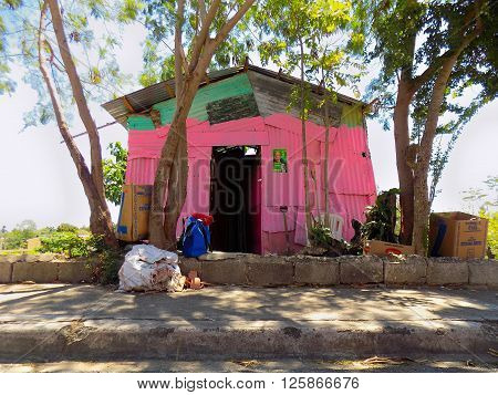 poor little pink house, zinc small house pink