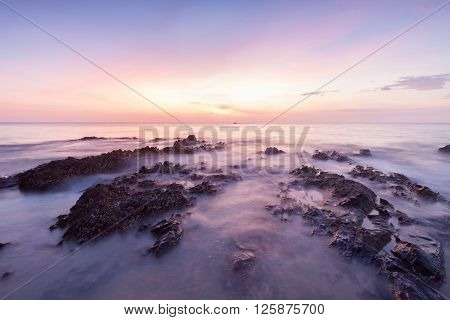 Amazing seascape during sunset with slow shutter technique