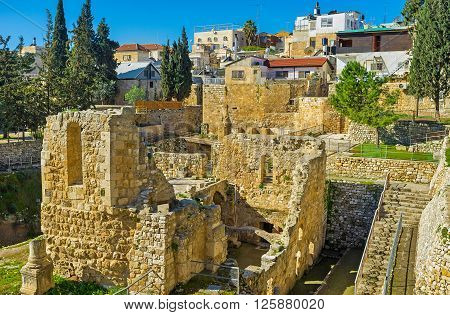 The walled town of Jerusalem stores the ruins of the Roman and Byzantine period at the archaeological site of Bethesda Pool Israel.
