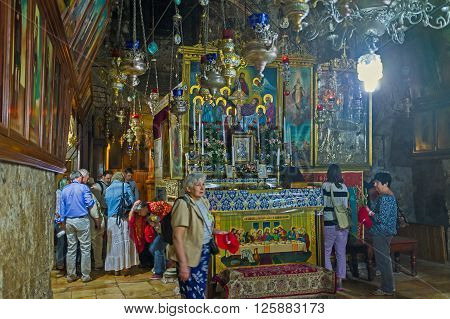 JERUSALEM ISRAEL - FEBRUARY 16 2016: The line of pilgrims to the Edicule of Virgin Mary in Church of the Assumption (Mary's Tomb) on February 16 in Jerusalem