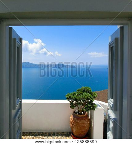 Beautiful sea view from the balcony. Oia town, Santorini island, Greece.